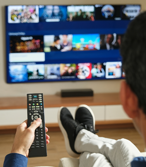 Man Watching TV on Couch